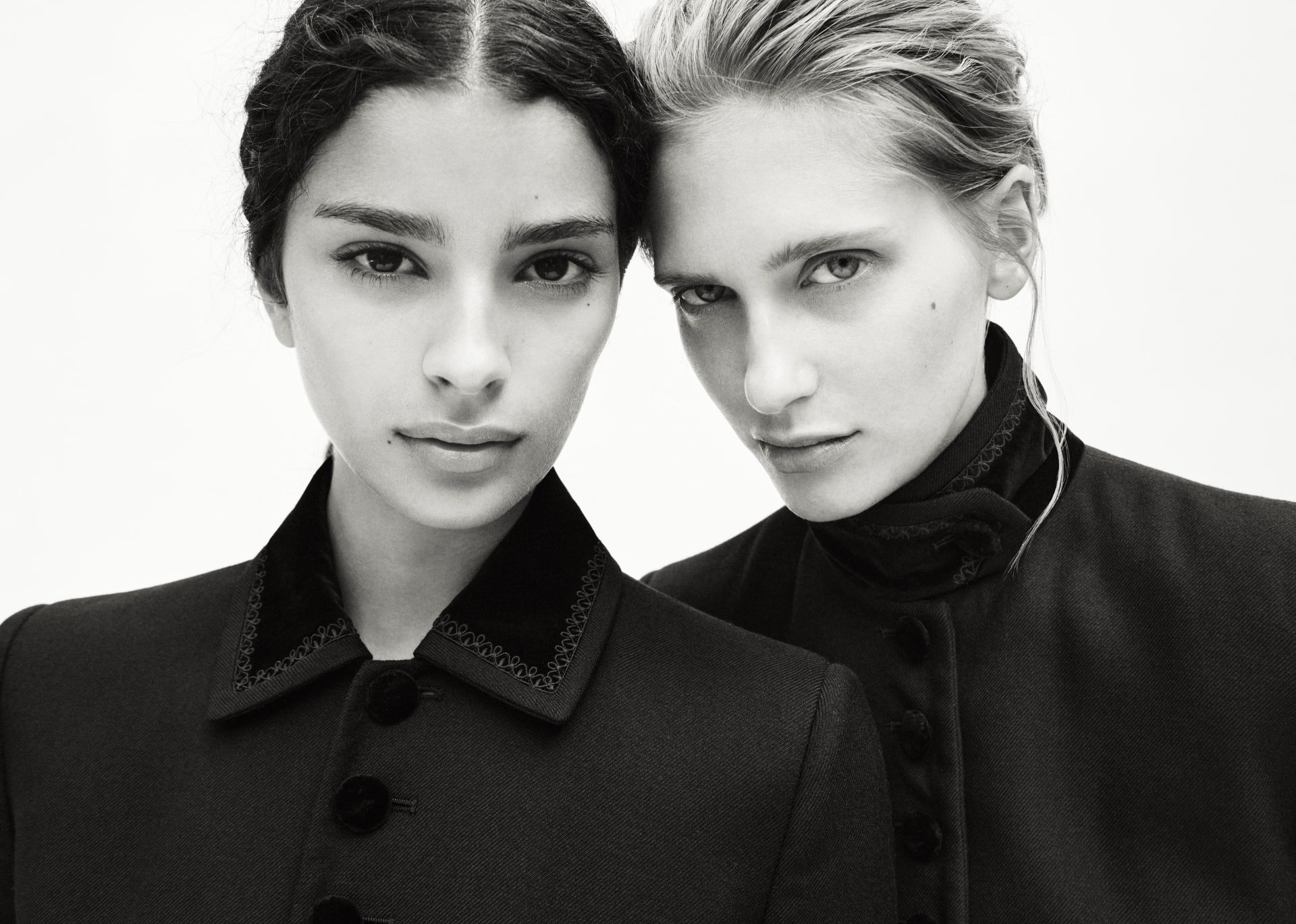 Two models wearing B. Corlès jackets